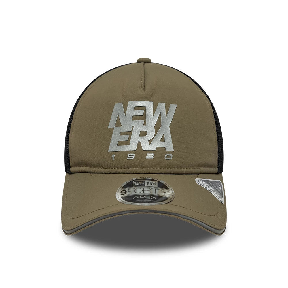 New Era Performance Green 9FORTY M-Crown A-Frame Trucker Adjustable Cap, front view showing the silver embroidered New Era 1920 logo on the structured green front panel, with a curved visor featuring a 9FORTY size sticker.