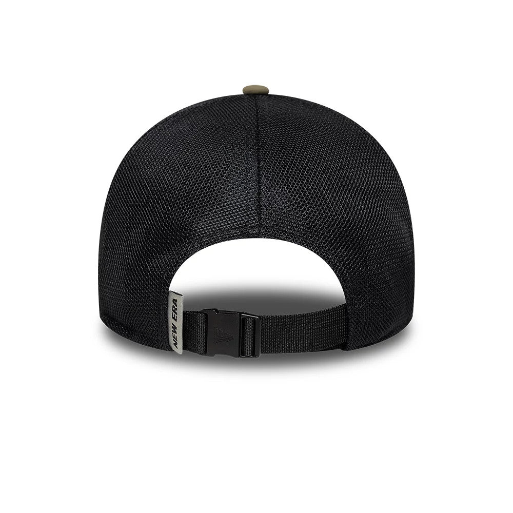 New Era Performance Green 9FORTY M-Crown A-Frame Trucker Adjustable Cap, rear view showing the black mesh back panels with an opening, a black adjustable strap with a clip at the centre, and a New Era tag on the left side.