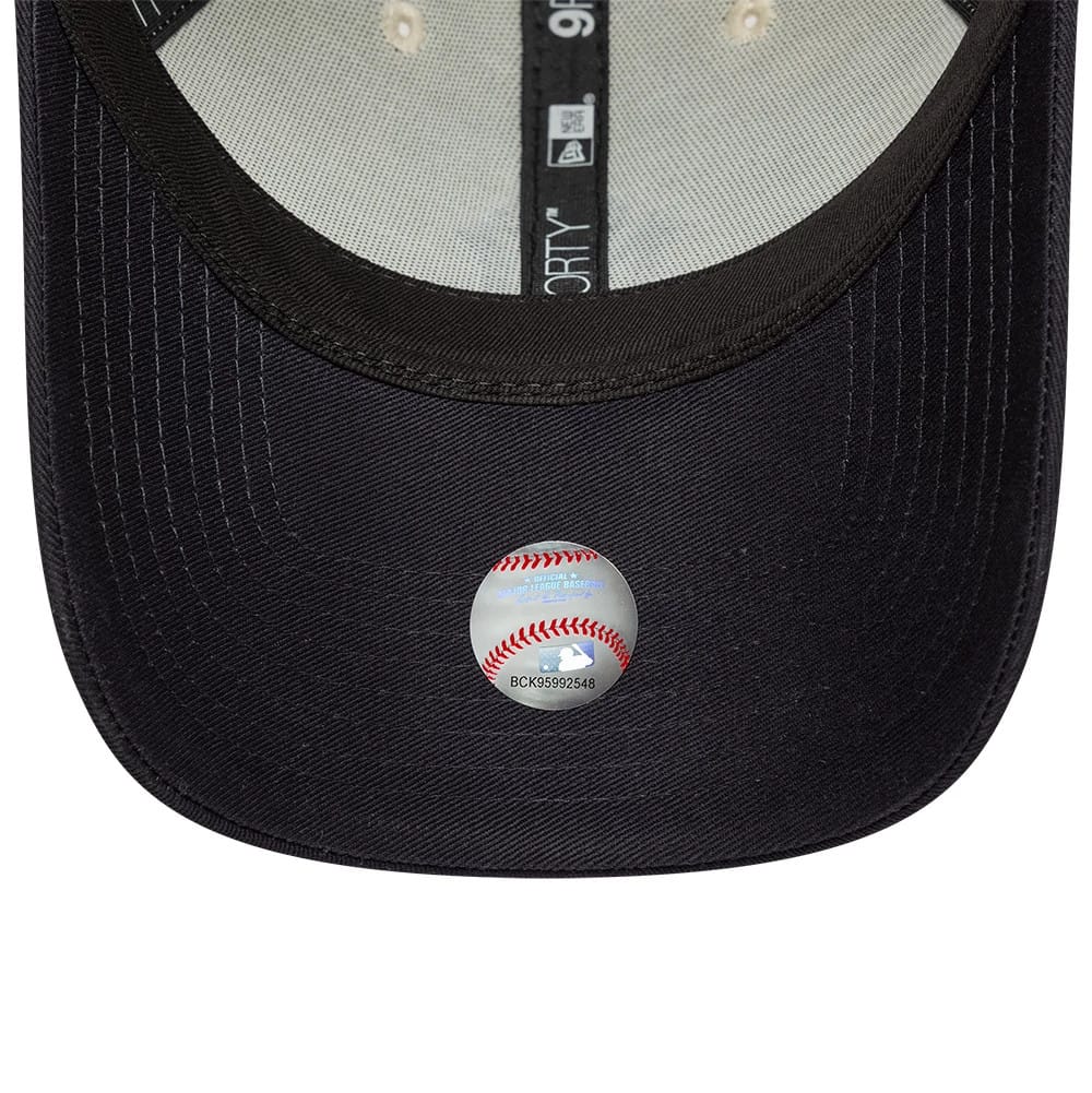 Pictured is this MLB World Series Patch New York Yankees 9FORTY cap in Cream. 6