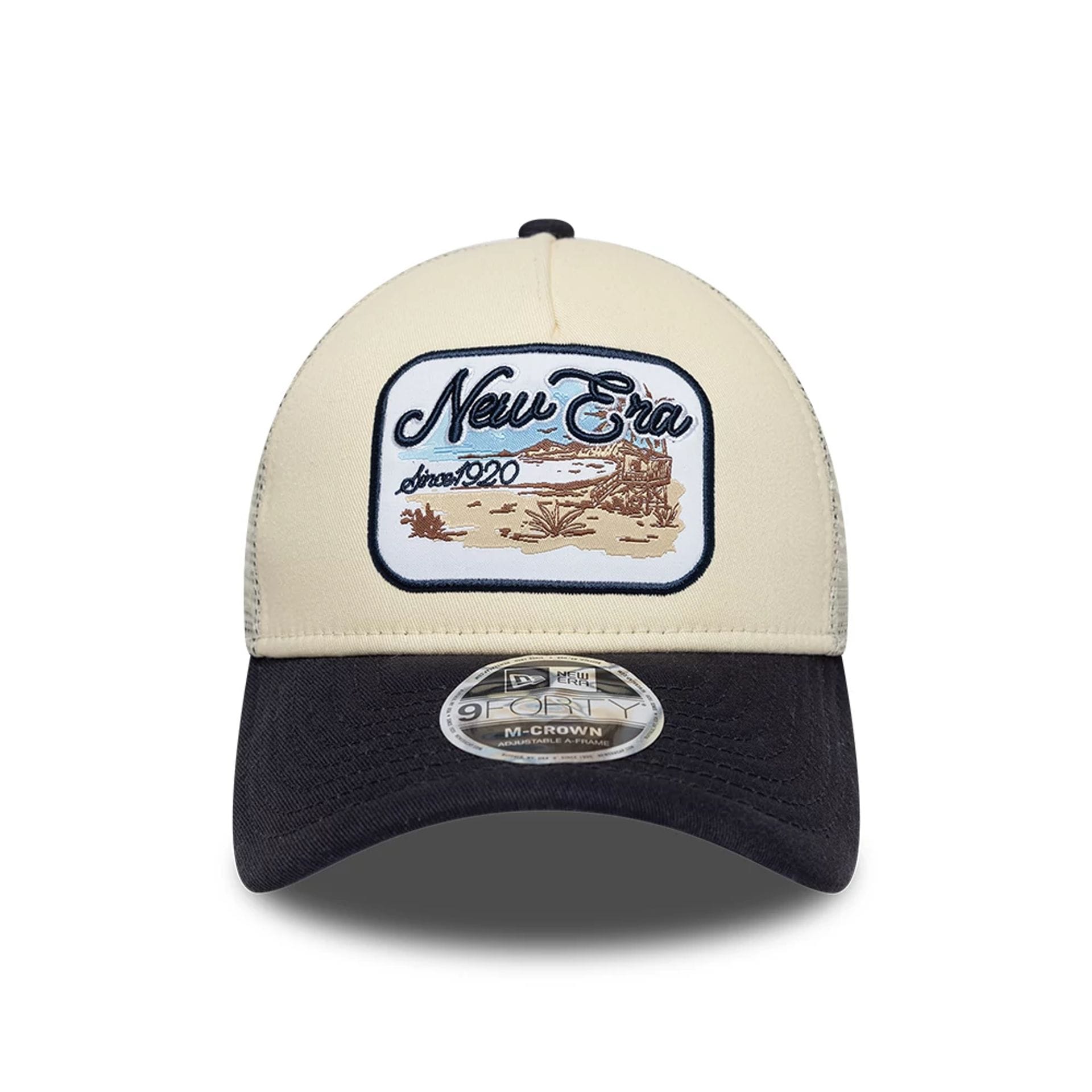 Pictured is this New Era 9FORTY M-Crown A-Frame Trucker cap in light beige. 2