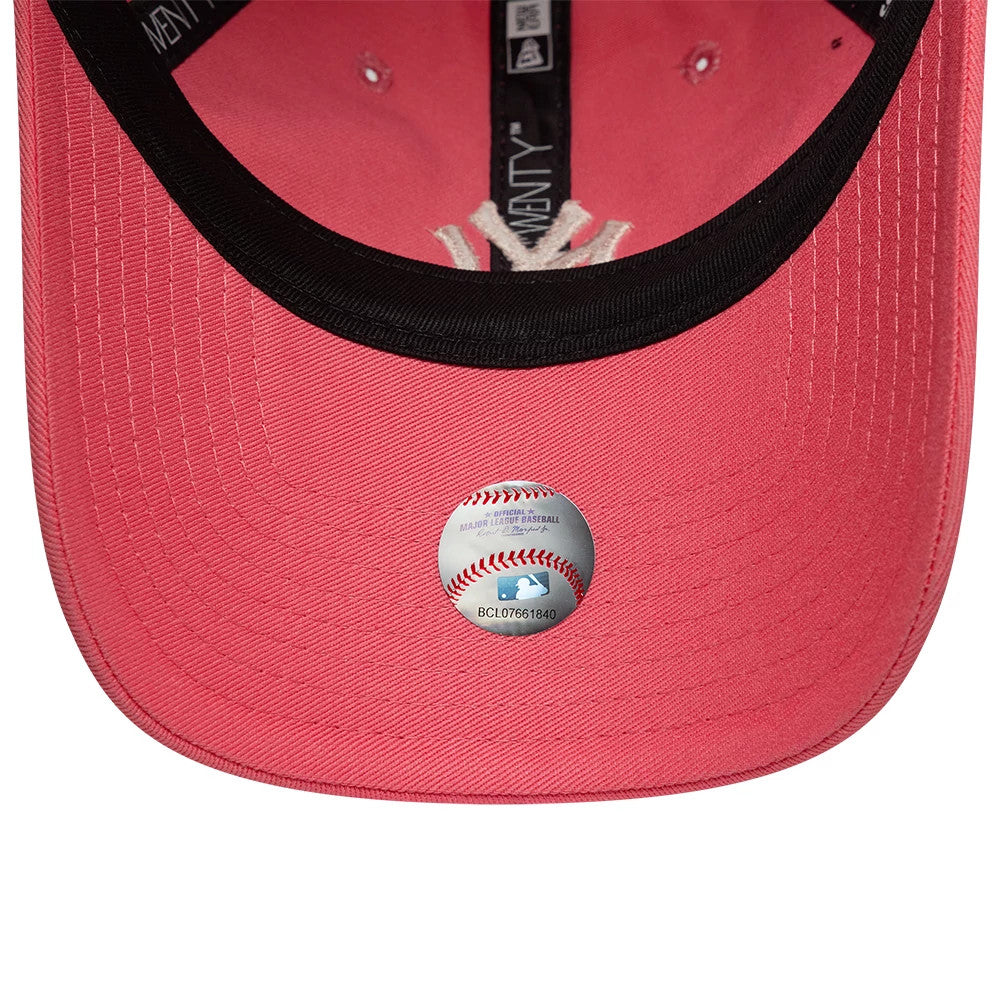 New York Yankees Womens MLB League Essential Pink New Era 9TWENTY Adjustable Cap, inside view showing the black sweatband, pink undervisor with an official MLB sticker, and printed taping.