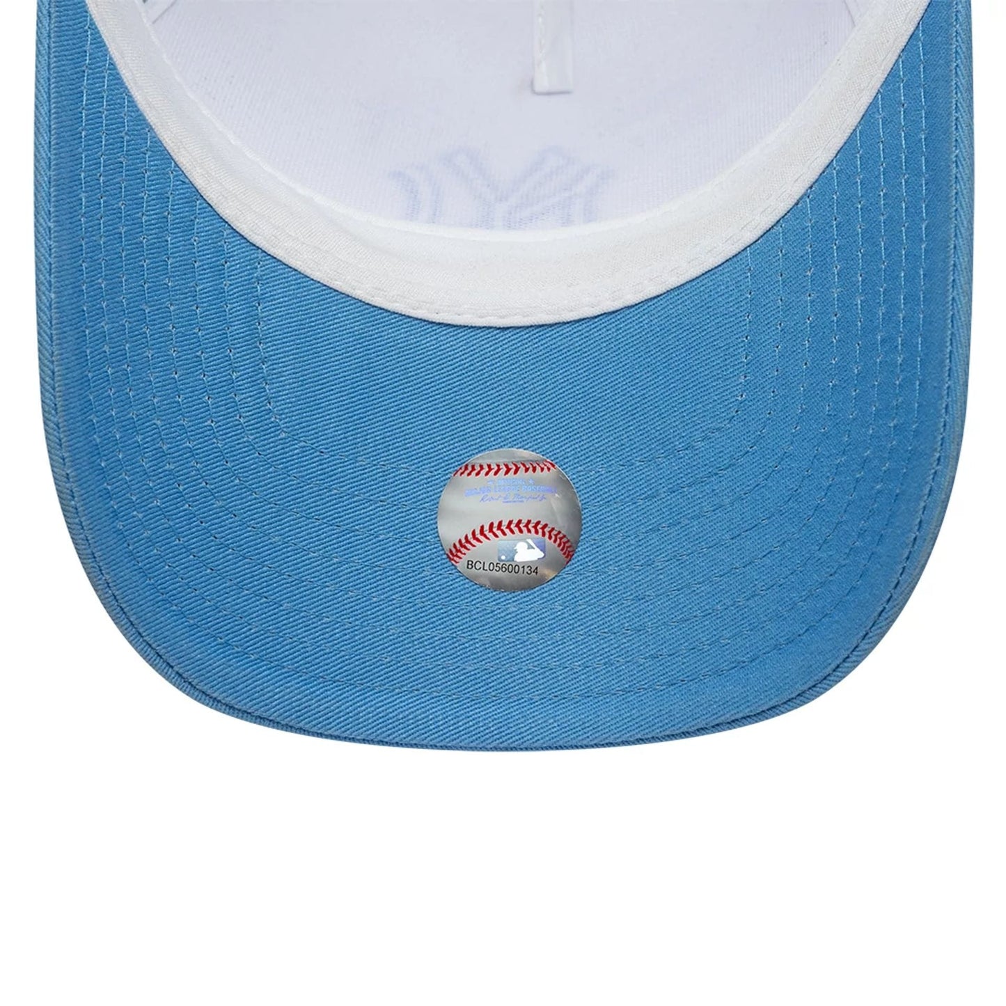Pictured is this MLB League Essential New York Yankees 9FORTY A-Frame Trucker cap in pastel blue. 5