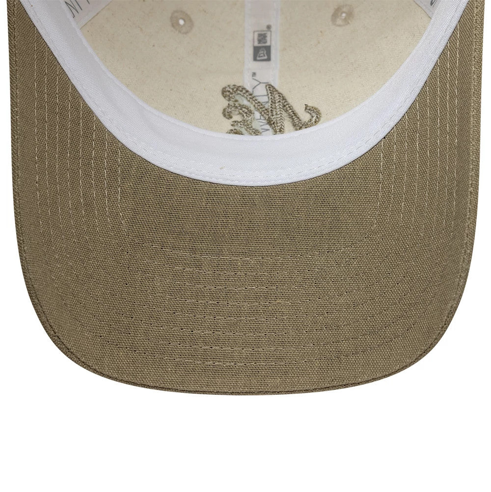 Womens New Era Linen Beige 9TWENTY Adjustable Cap, inside view showing the white sweatband along the interior edge, the beige undervisor matching the crown, white taping with brand labels, and beige stitching details.