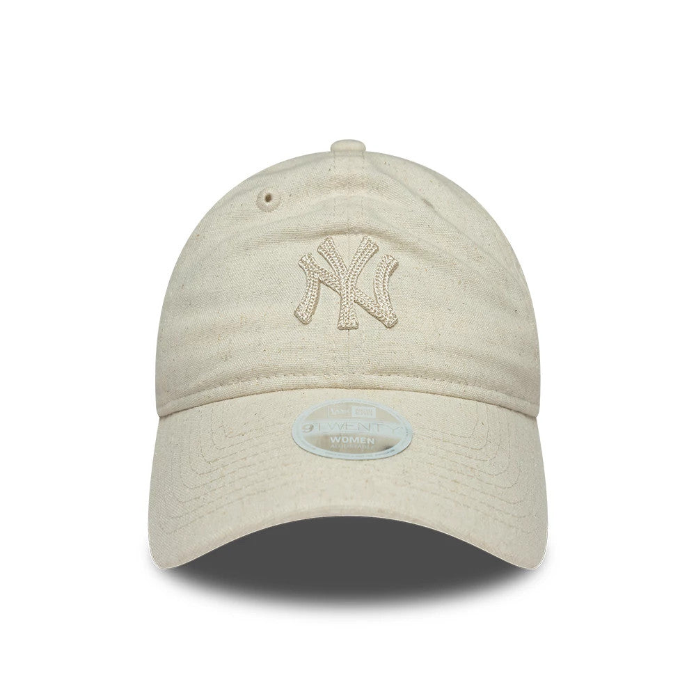 New York Yankees Womens MLB Linen Light Beige New Era 9TWENTY Adjustable Cap, front view showing the raised beige embroidered NY logo on the linen crown, with a curved beige visor and a clear 9TWENTY size sticker on the centre of the visor.