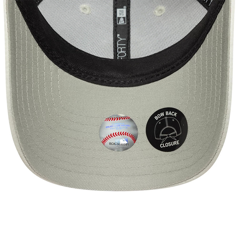 New York Yankees Womens MLB Satin Bow Back Grey New Era 9FORTY Adjustable Cap, inside view showing the grey undervisor, black sweatband with brand taping, and Bow Back Closure sticker alongside an MLB baseball hologram sticker.