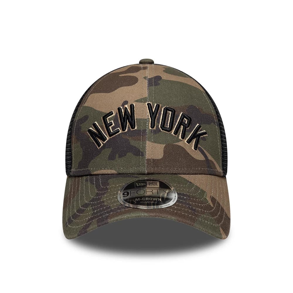 New York Yankees MLB Wordmark Woodland Camo New Era 9FORTY M-Crown Adjustable Cap, front view showing the black embroidered New York wordmark on the structured woodland camo crown with a curved visor featuring a 9FORTY size sticker.