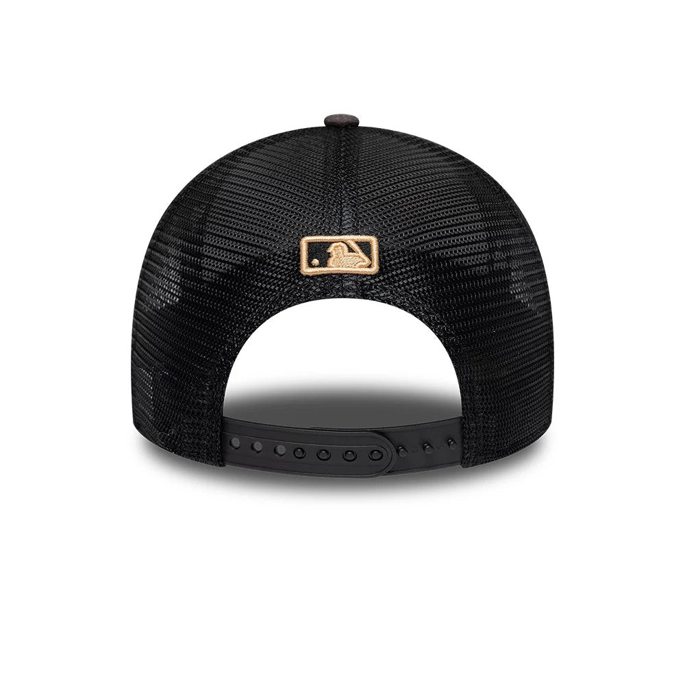 New York Yankees MLB Wordmark Woodland Camo New Era 9FORTY M-Crown Adjustable Cap, rear view showing the tan embroidered MLB Batterman logo at the centre of the back panels, on a black mesh crown with an adjustable snap closure.