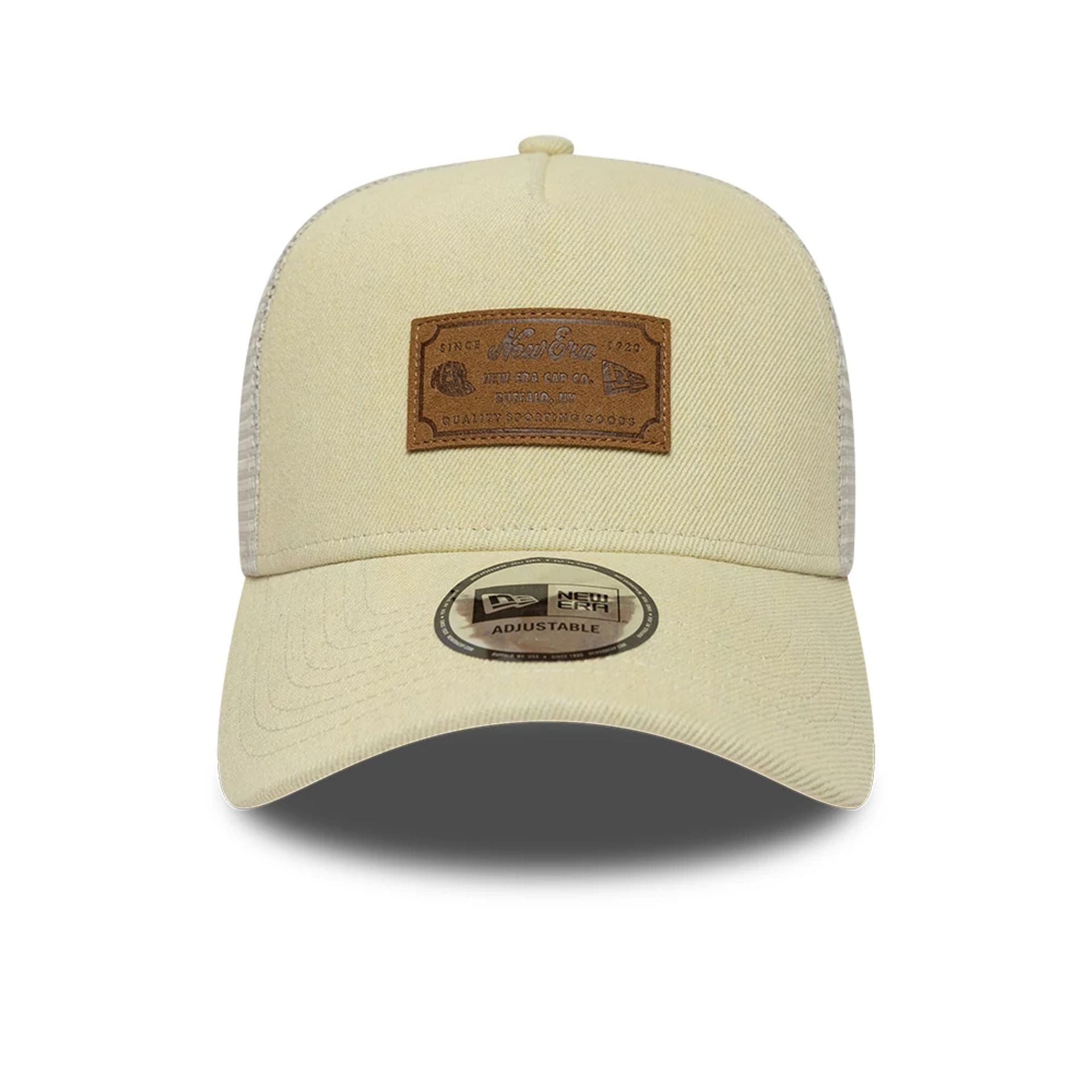 Pictured is this New Era Leather Patch 9FORTY A-Frame Trucker cap in light beige. 2