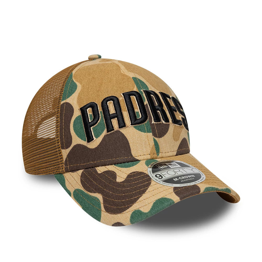 San Diego Padres MLB Wordmark Duck Camo New Era 9FORTY M-Crown Adjustable Cap, three-quarter view showing the black raised embroidered PADRES lettering on the camo print front panel, with a brown mesh back and 9FORTY size sticker on the visor.