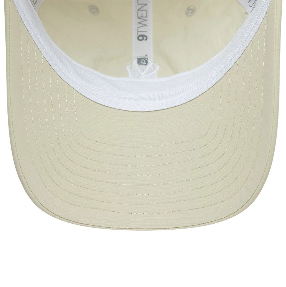New York Yankees MLB Recycled Light Beige New Era 9TWENTY Adjustable Cap, inside view showing a white sweatband, contrasting beige undervisor and white taping with the 9TWENTY logo, along with stitching and the New Era flag logo tag.