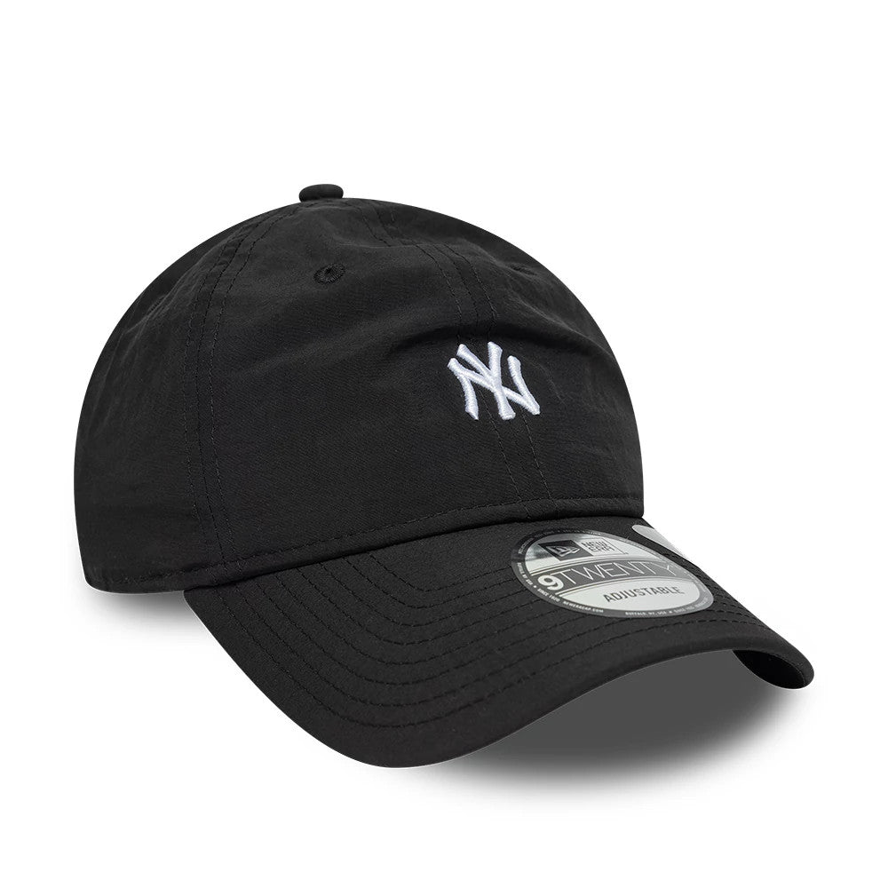 New York Yankees MLB Recycled Black New Era 9TWENTY Adjustable Cap, three-quarter view showing the white embroidered NY logo on the unstructured black crown, curved black visor with 9TWENTY size sticker, and top button matching the crown.