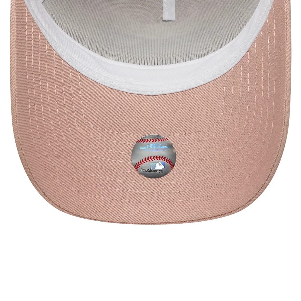 Pictured is this MLB Outline New York Yankees 9FORTY E-Frame Trucker cap in pastel pink. 5