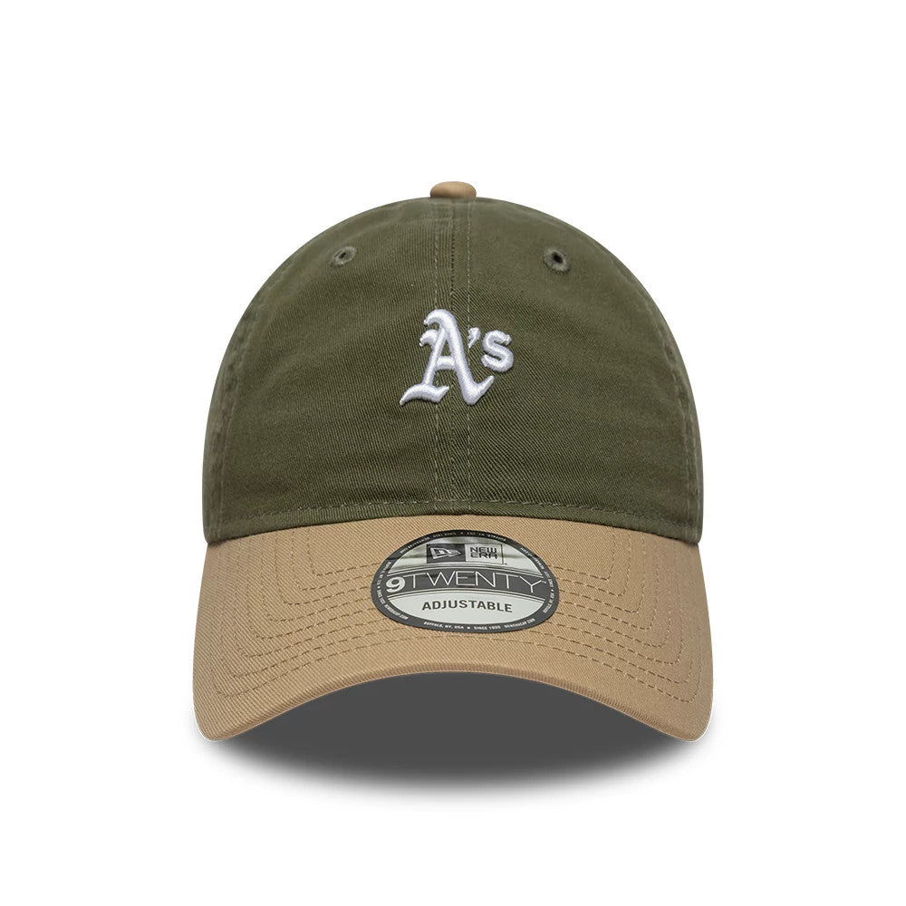 Athletics MLB Washed Contrast Green New Era 9TWENTY Adjustable Cap, front view showing the white A's logo in raised embroidery on the structured green crown, a contrasting tan curved visor, and the 9TWENTY size sticker on the visor.