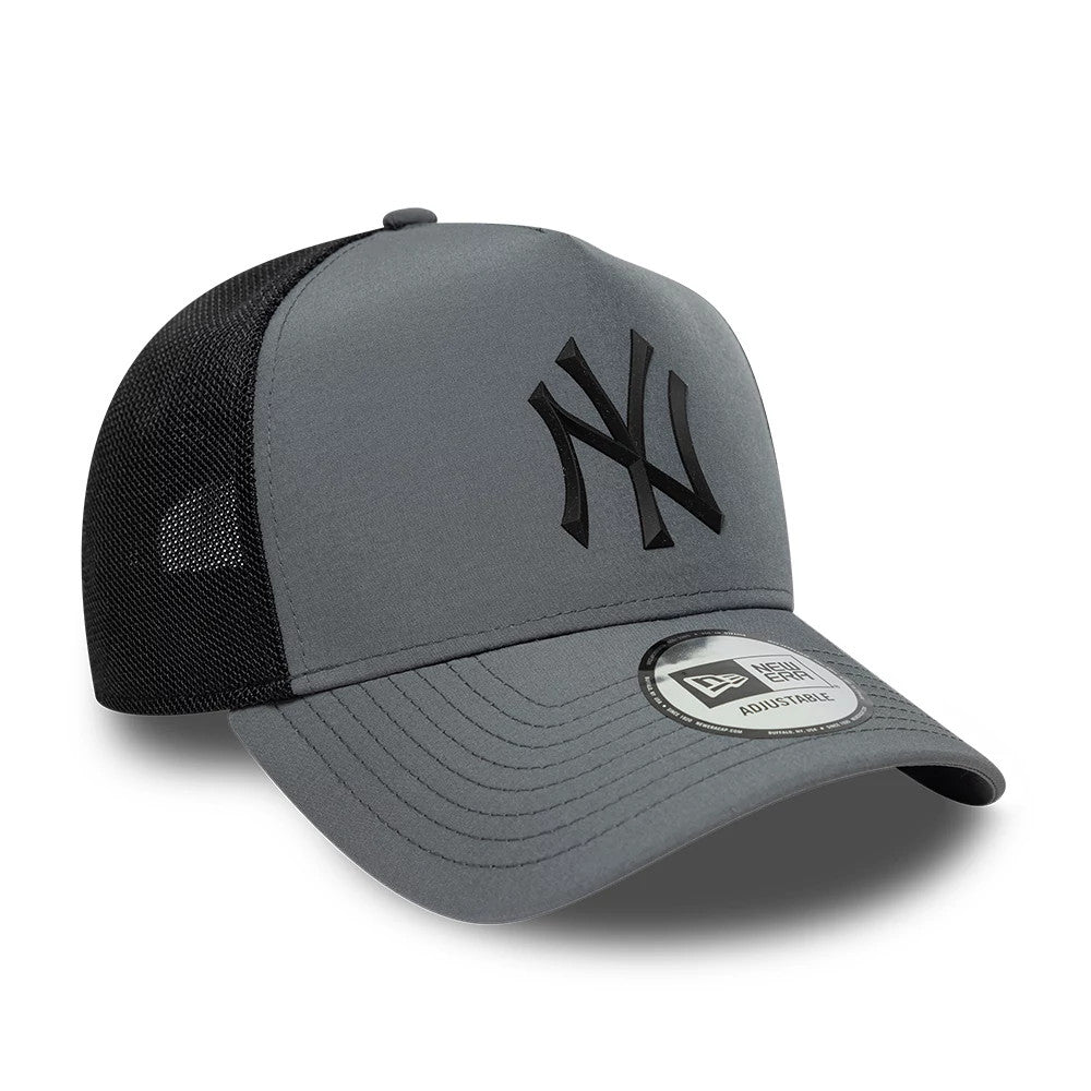New York Yankees MLB Sport Charcoal New Era 9FORTY E-Frame Trucker Adjustable Cap, three-quarter view showing a black raised embroidered NY logo on the structured charcoal front panel, with a rounded black mesh rear.