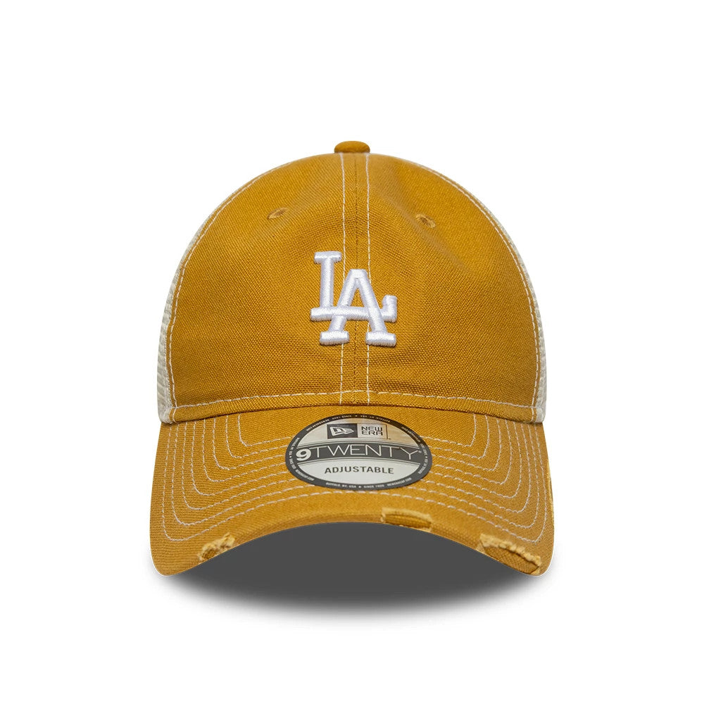 LA Dodgers MLB Cotton Canvas Beige New Era 9TWENTY Trucker Adjustable Cap, front view showing a white raised embroidered LA logo on the front panel, with a curved visor and a 9TWENTY size sticker on the visor.