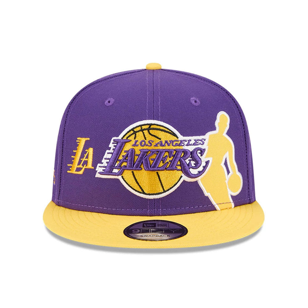 LA Lakers NBA Hardwood Classic ASG Purple New Era 9FIFTY Snapback Adjustable Cap, front view showing a purple and yellow embroidered LA Lakers graphic across the front panels, paired with a contrasting yellow visor and a 9FIFTY size sticker.