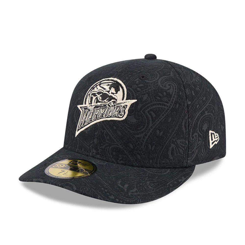 Golden State Warriors NBA Brushed Cotton Black New Era 59FIFTY Fitted Cap, three-quarter view showing a cream embroidered Warriors logo on the front panel, a paisley pattern on the black fabric, and a gold 59FIFTY size sticker on the visor.