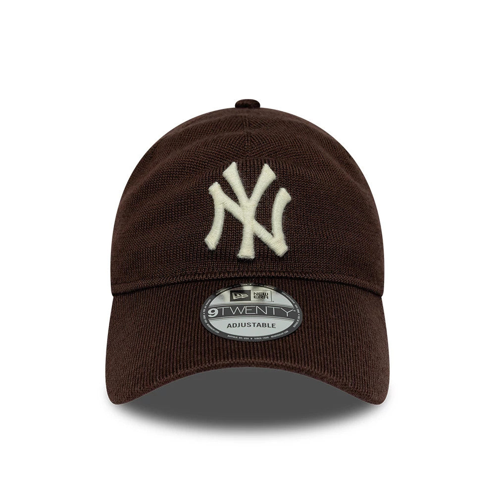 New York Yankees MLB Merino Wool Dark Brown New Era 9TWENTY Adjustable Cap, front view showing the raised cream NY logo embroidery on the unstructured crown, brown curved visor and 9TWENTY size sticker centred beneath the logo.