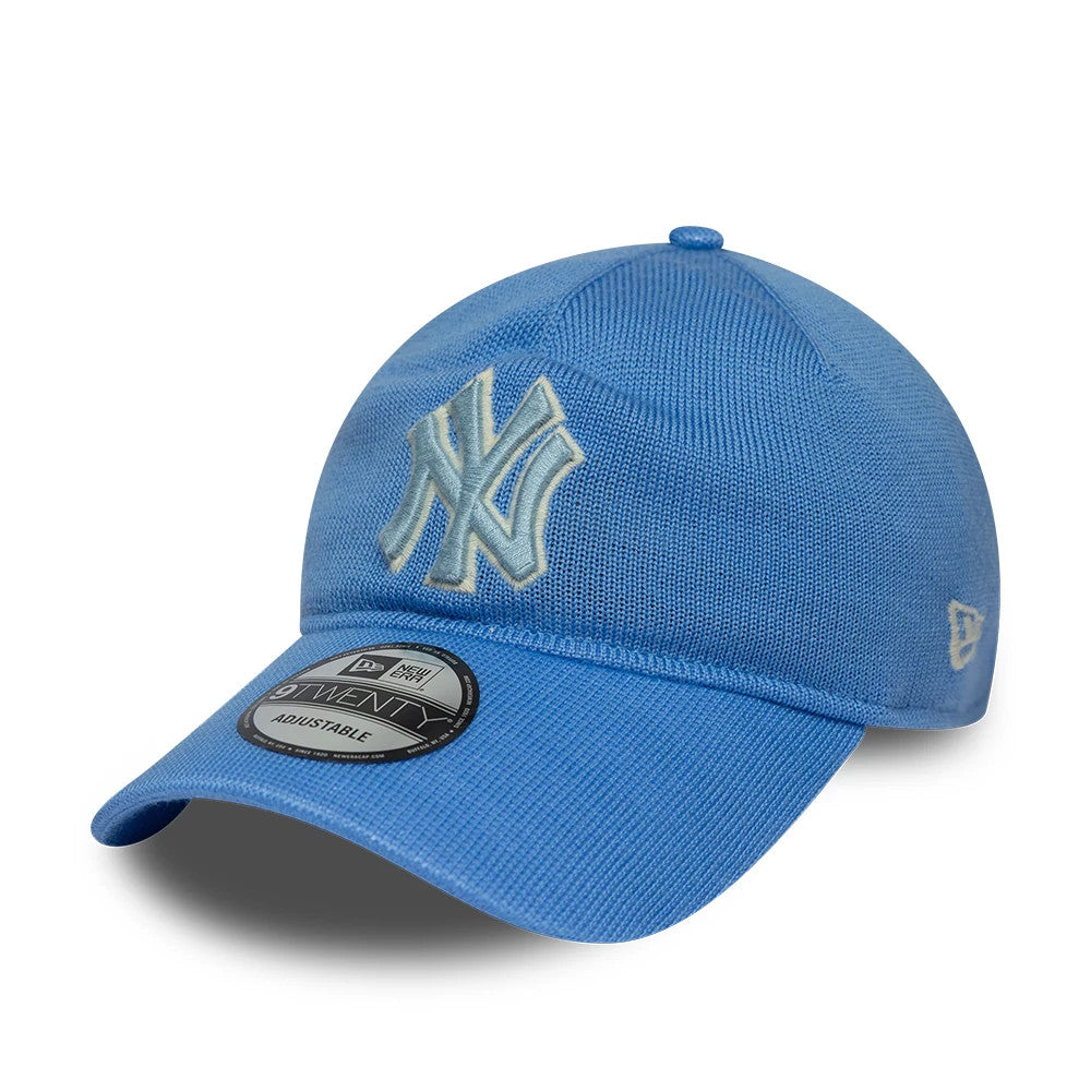 New York Yankees MLB Merino Wool Pastel Blue New Era 9TWENTY Adjustable Cap, three-quarter view showing the light blue embroidered NY logo on the front panel, a matching pastel blue curved visor with a 9TWENTY size sticker.