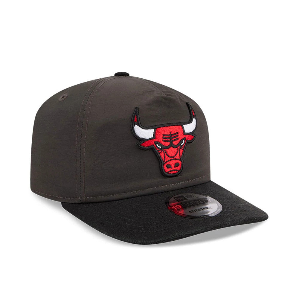 Chicago Bulls NBA Nylon Black New Era 19TWENTY Adjustable Cap, three-quarter view showing an embroidered red bull logo on the front panel, a contrasting black curved visor, and a 19TWENTY size sticker placed centrally on the visor.