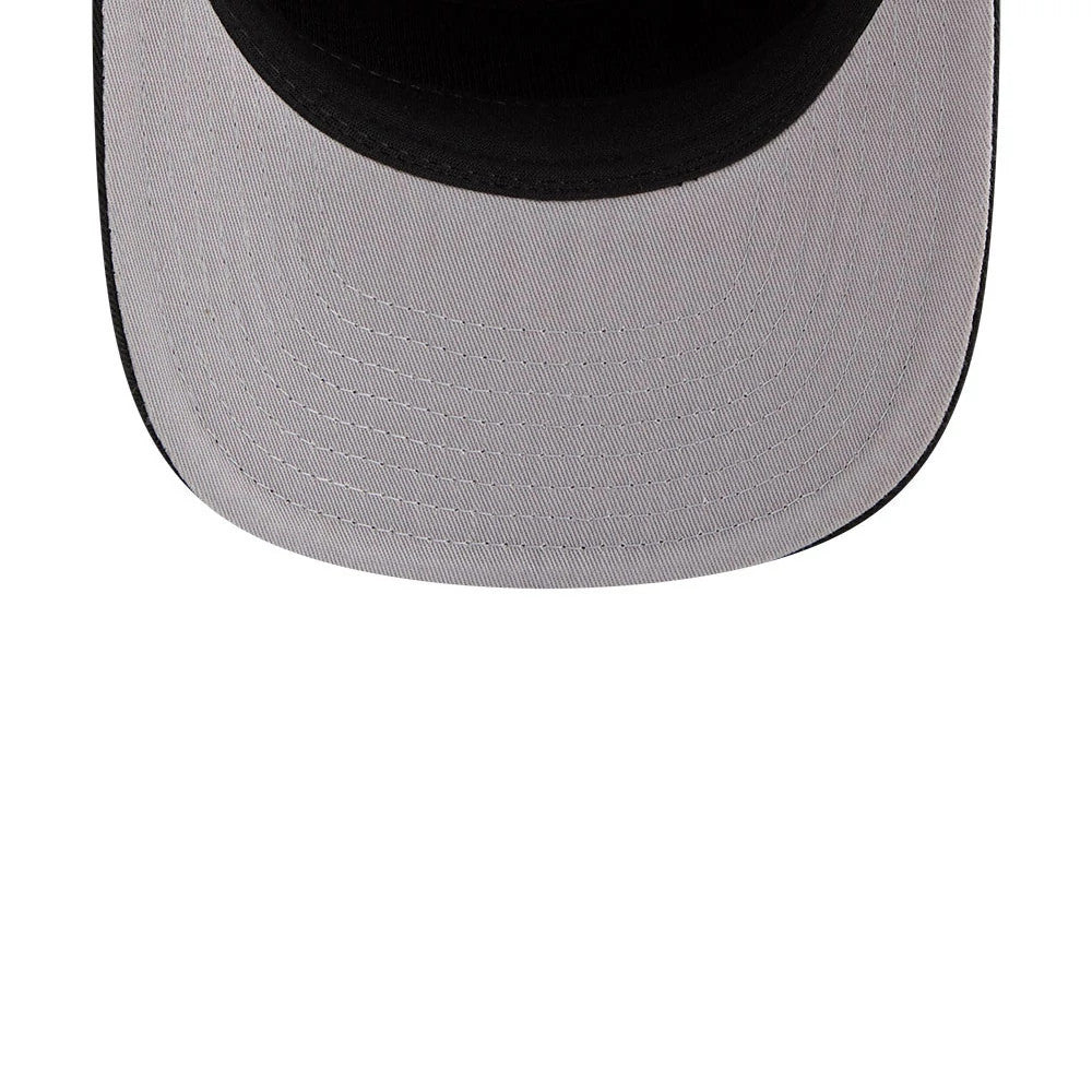 Chicago Bulls NBA Nylon Black New Era 19TWENTY Adjustable Cap, inside view showing the bright grey undervisor contrasted against the black sweatband, with stitching lines and fabric texture along the inner panel.