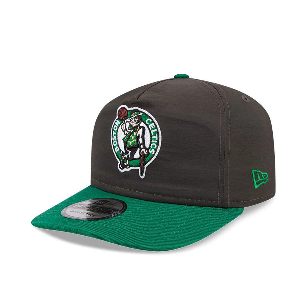 Boston Celtics NBA Nylon Black New Era 19TWENTY Adjustable Cap, three-quarter view showing the raised embroidered Celtics logo on the front panel, green New Era flag logo on the left side, and a green curved visor with a 19TWENTY size sticker.