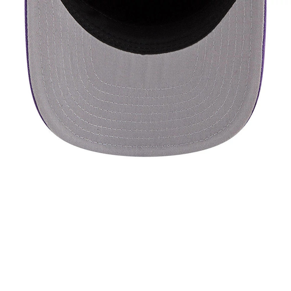 LA Lakers NBA Nylon Black New Era 19TWENTY Adjustable Cap, inside view showing the grey undervisor with detailed stitching, a black interior sweatband circling the crown, and purple edging along the sides of the visor.