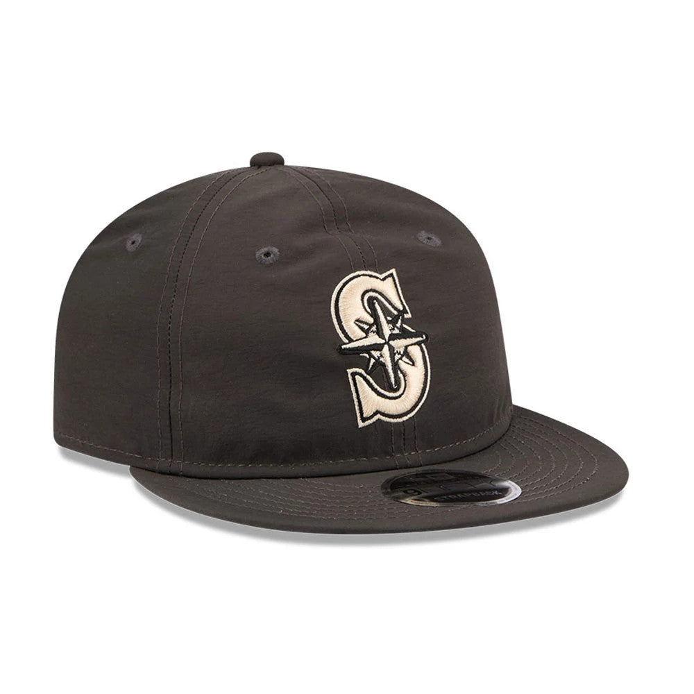 Seattle Mariners MLB Nylon Black Retro Crown New Era 9FIFTY Adjustable Cap, three-quarter view showing the raised embroidered Mariners logo on the front panel, a flat black visor with a 9FIFTY size sticker, and black eyelets on the crown.