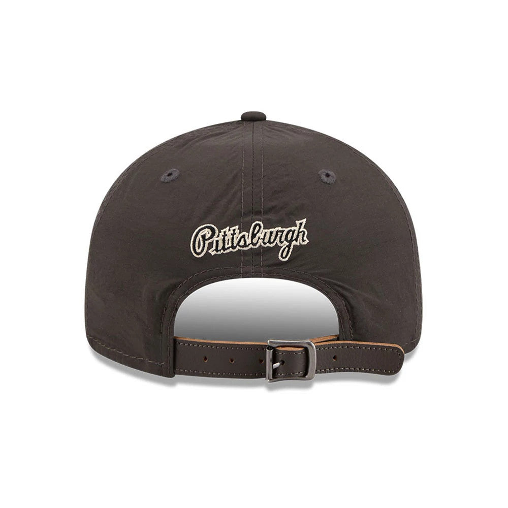 Pittsburgh Pirates MLB Nylon Black Retro Crown New Era 9FIFTY Adjustable Cap, rear view showing the cream embroidered Pittsburgh script logo centred on the black panels, with a thick black and brown leather strap with silver buckle.