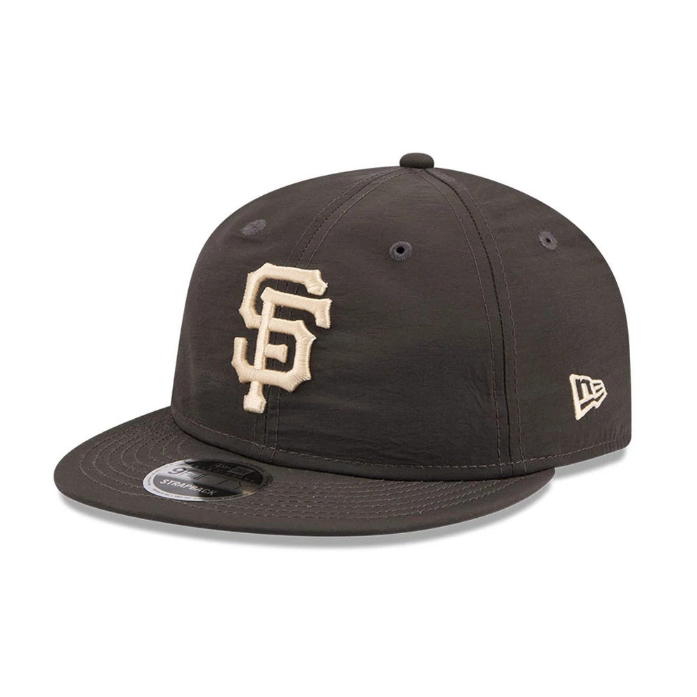 San Francisco Giants MLB Nylon Black Retro Crown New Era 9FIFTY Adjustable Cap, three-quarter view showing the raised white embroidered SF logo on the front panel, black flat visor with a 9FIFTY size sticker, and New Era flag logo on the left side.