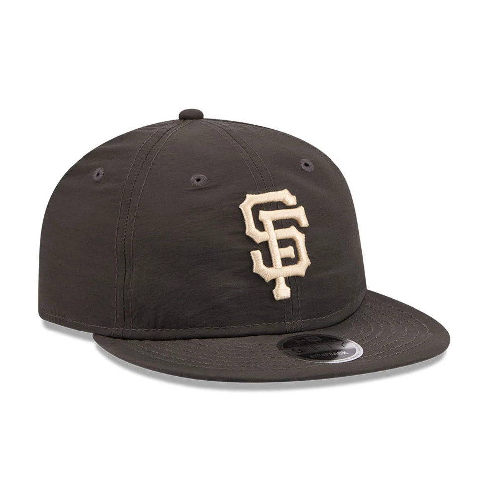 San Francisco Giants MLB Nylon Black Retro Crown New Era 9FIFTY Adjustable Cap, three-quarter view showing the raised embroidered SF logo on the front panel, a black flat visor, and a 9FIFTY size sticker on the visor.