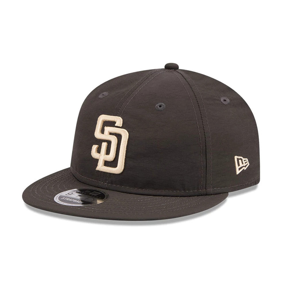 San Diego Padres MLB Nylon Black Retro Crown New Era 9FIFTY Adjustable Cap, three-quarter view showing the raised embroidered SD logo on the front panel, black flat visor with a 9FIFTY size sticker, and New Era flag logo on the left side.