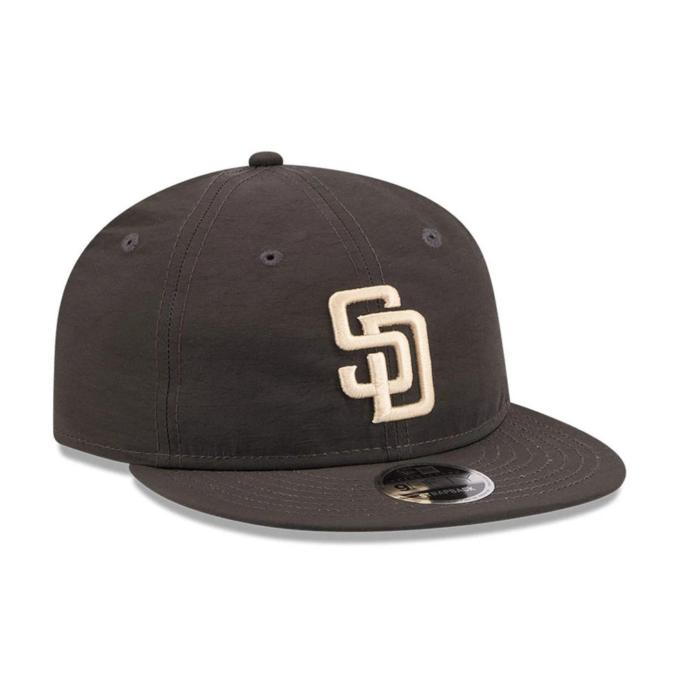 San Diego Padres MLB Nylon Black Retro Crown New Era 9FIFTY Adjustable Cap, three-quarter view showing the cream SD logo in raised embroidery on the front panel, flat black visor, and 9FIFTY size sticker on the visor.