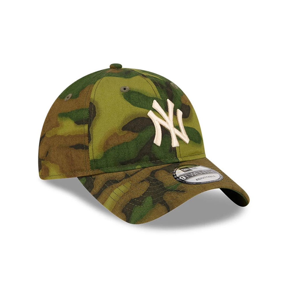 New York Yankees MLB Ripstop Camo New Era 9TWENTY Adjustable Cap, three-quarter view showing the raised white embroidered NY logo on the front panel, green camo pattern on the unstructured crown, and the 9TWENTY size sticker on the visor.