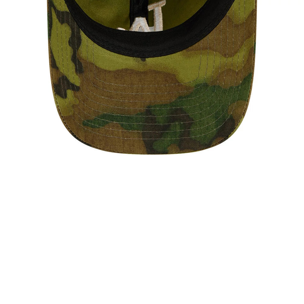 LA Dodgers MLB Ripstop Camo New Era 9TWENTY Adjustable Cap, inside view showing the black sweatband along the edge, camo-patterned undervisor in shades of green and brown, and contrasting white taping with printed details.