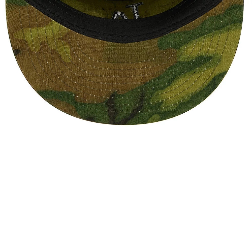 New Era LA Dodgers MLB Ripstop Camo Painter Cap, inside view showing the green and brown camo pattern on the visor, black sweatband along the edge, and white embroidered text on the inner crown fabric.