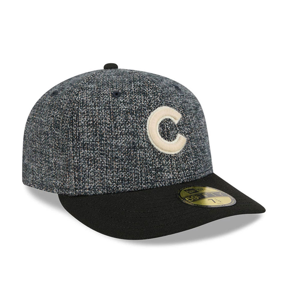 Chicago Cubs MLB Tweedy Cotton Black New Era 59FIFTY Fitted Cap, three-quarter view showing the white raised embroidered C logo on the tweedy crown, with a black flat visor and a gold 59FIFTY size sticker on the visor.