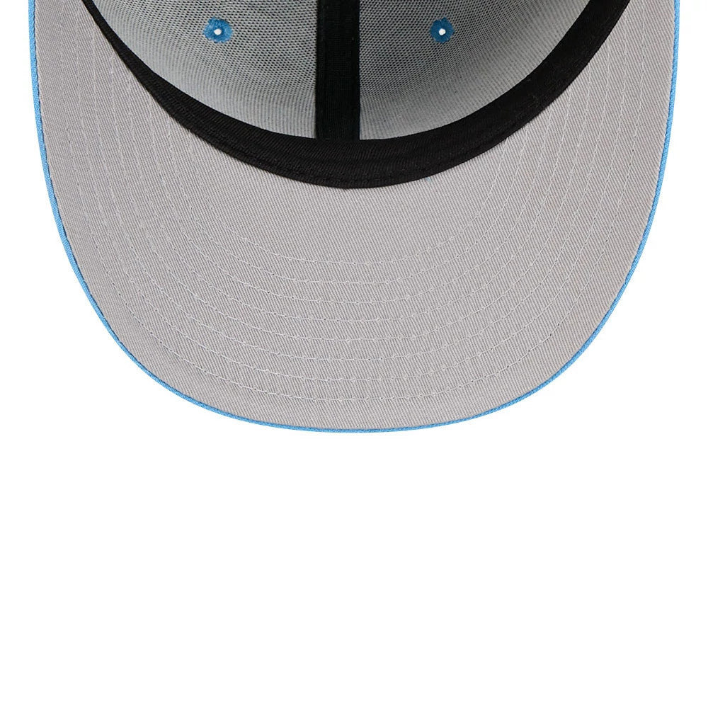 New York Yankees MLB Tweedy Cotton Pastel Blue New Era 59FIFTY Fitted Cap, inside view showing the grey undervisor with a blue edge, black internal taping along the seams, and a black sweatband for added comfort and support.