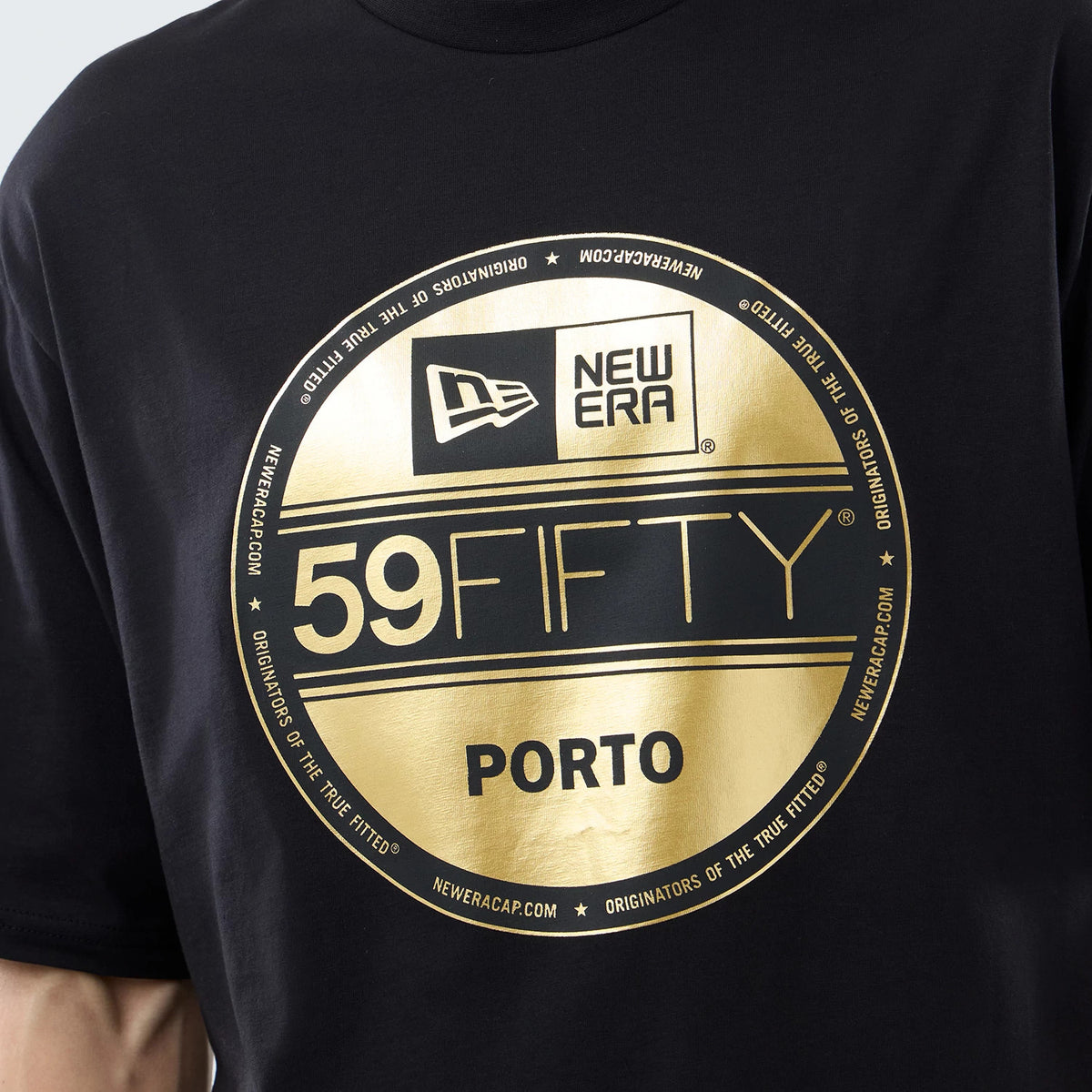 New Era Sticker Porto Black Oversized T-Shirt, front view showing a large gold printed circular graphic on the black fabric featuring the New Era logo at the top, 59FIFTY lettering in the centre, and Porto text below.