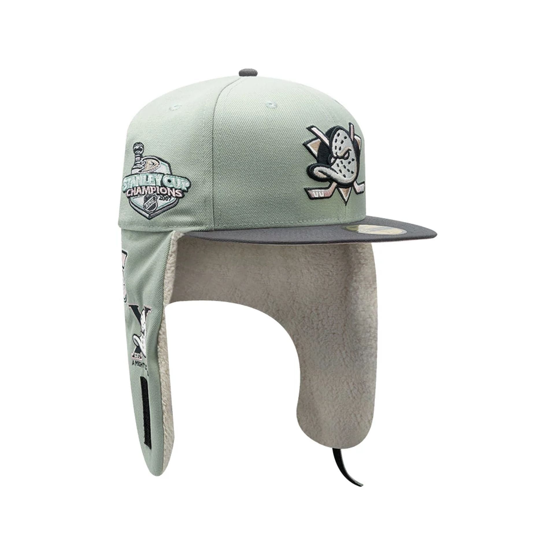 Pictured is this NHL Patch Anaheim Ducks Dogear 59FIFTY Fitted cap in pastel green. 2