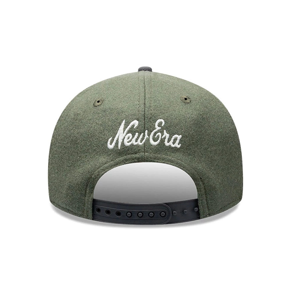New Era Melton Wool Green Retro Crown 9FIFTY Cap, rear view showing the white embroidered New Era script logo across the back panels, with an adjustable black snapback closure and two black eyelets on the crown.