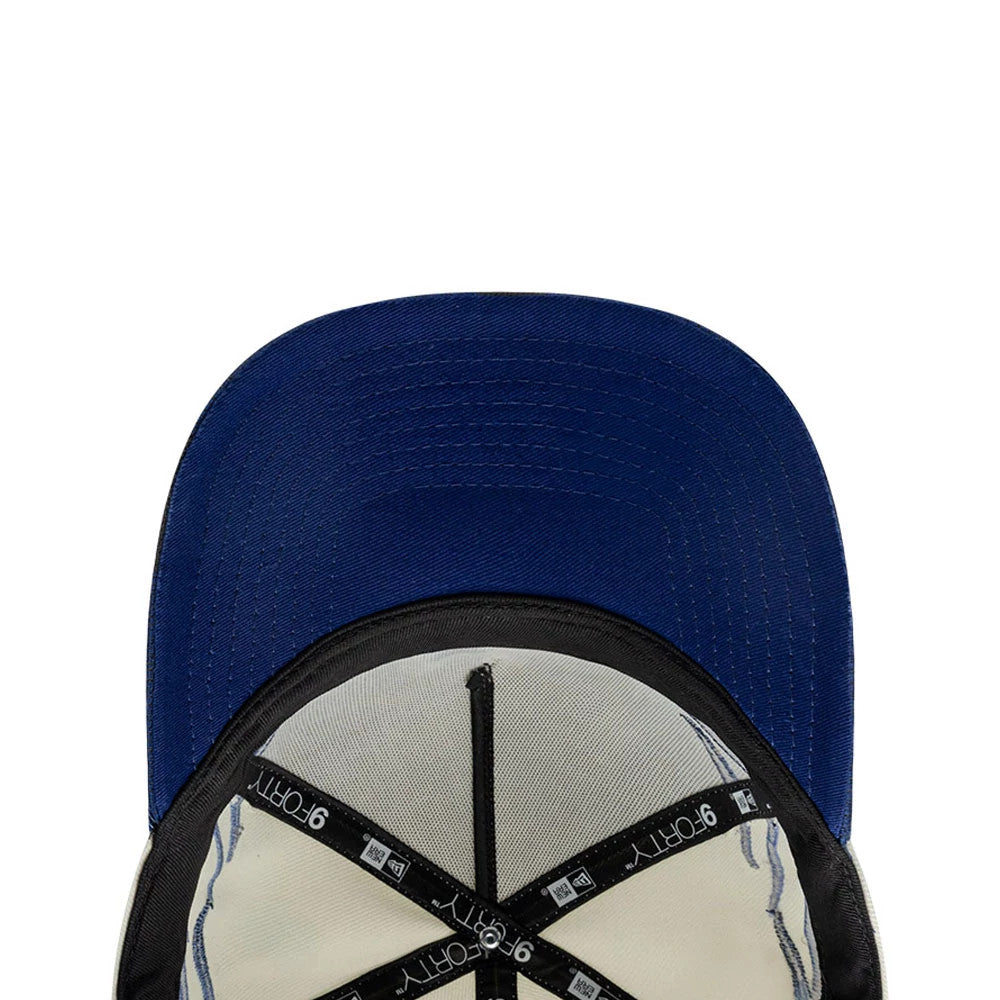 LA Dodgers MLB Flame Cream New Era 9FORTY A-Frame Cap, inside view showing the black sweatband, white inner panels, and black taping with white 9FORTY text, alongside a dark blue undervisor, highlighting the cap's detailed interior construction.