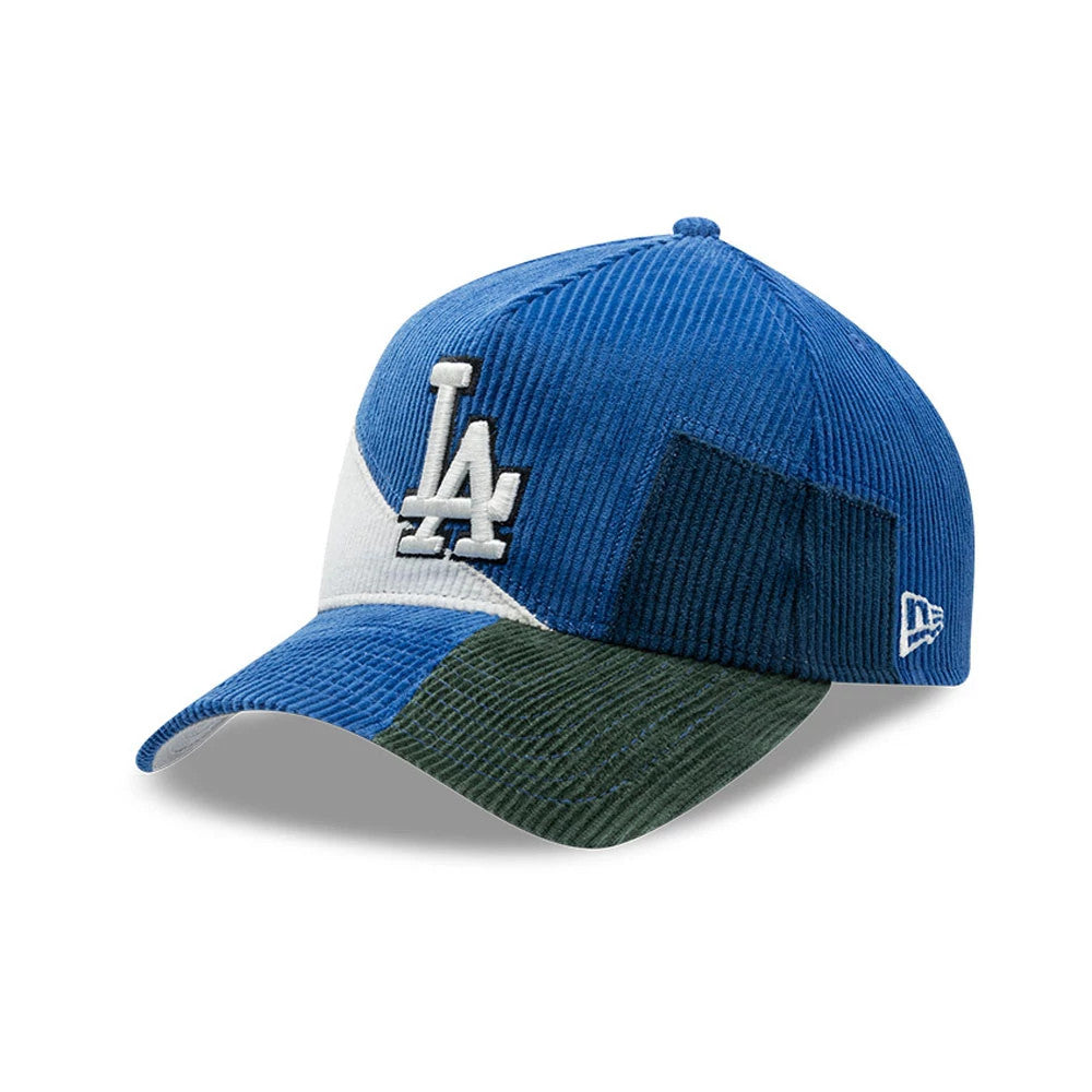 LA Dodgers MLB Patchwork Dark Blue New Era 9FORTY A-Frame Cap, three-quarter view showing raised white embroidered LA logo on the front panel, with a patchwork design in dark blue, green and white, and the New Era flag logo on the left side.