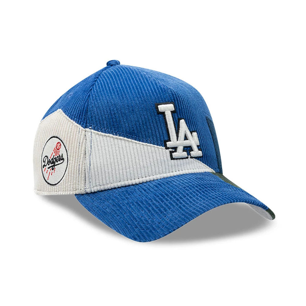 LA Dodgers MLB Patchwork Dark Blue New Era 9FORTY A-Frame Cap, three-quarter view showing the raised white LA logo embroidered on the front panel, a patchwork design with dark blue and white corduroy textures, and a Dodgers side patch.