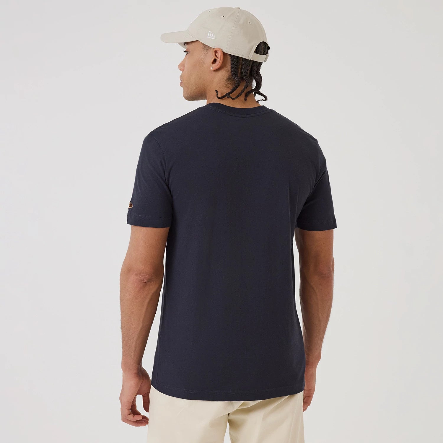 The model is wearing this MLB X Looney Tunes New York Yankees T-Shirt in navy. 2