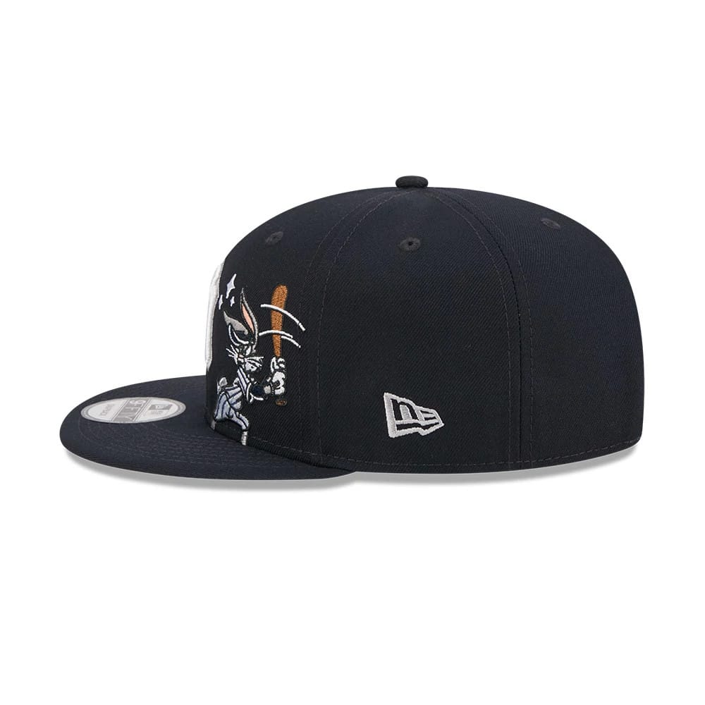 Pictured is this MLB X Looney Tunes Bugs Bunny New York Yankees 9FIFTY Snapback Adjustable cap in navy. 7