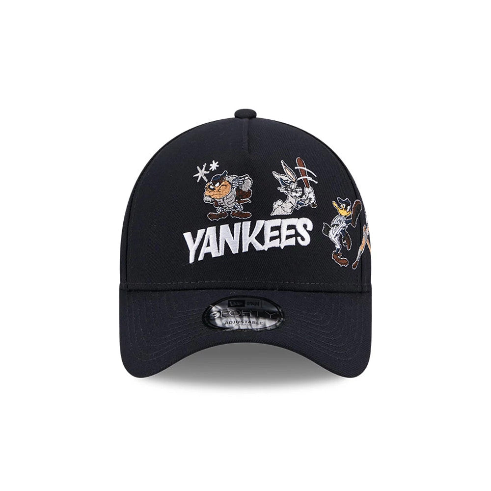 New York Yankees MLB X Looney Tunes Navy New Era 9FORTY A-Frame Adjustable Cap, front view showing raised white Yankees embroidery on the structured navy crown, surrounded by Taz, Bugs Bunny, and Sylvester cartoon graphics.