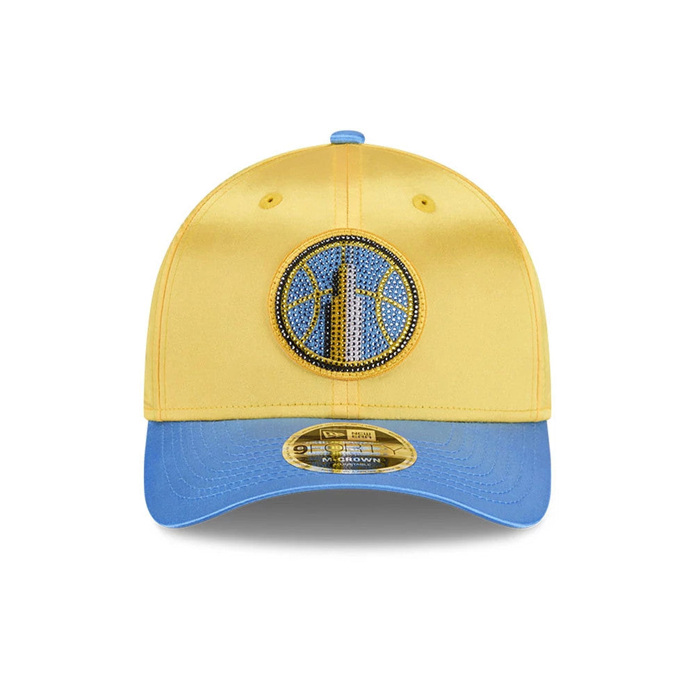 Chicago Sky WNBA Draft 2026 Yellow New Era 9FORTY M-Crown Adjustable Cap, front view showing a large circular embroidered logo in blue and yellow on the front panel, with a contrasting light blue curved visor and 9FORTY size sticker.