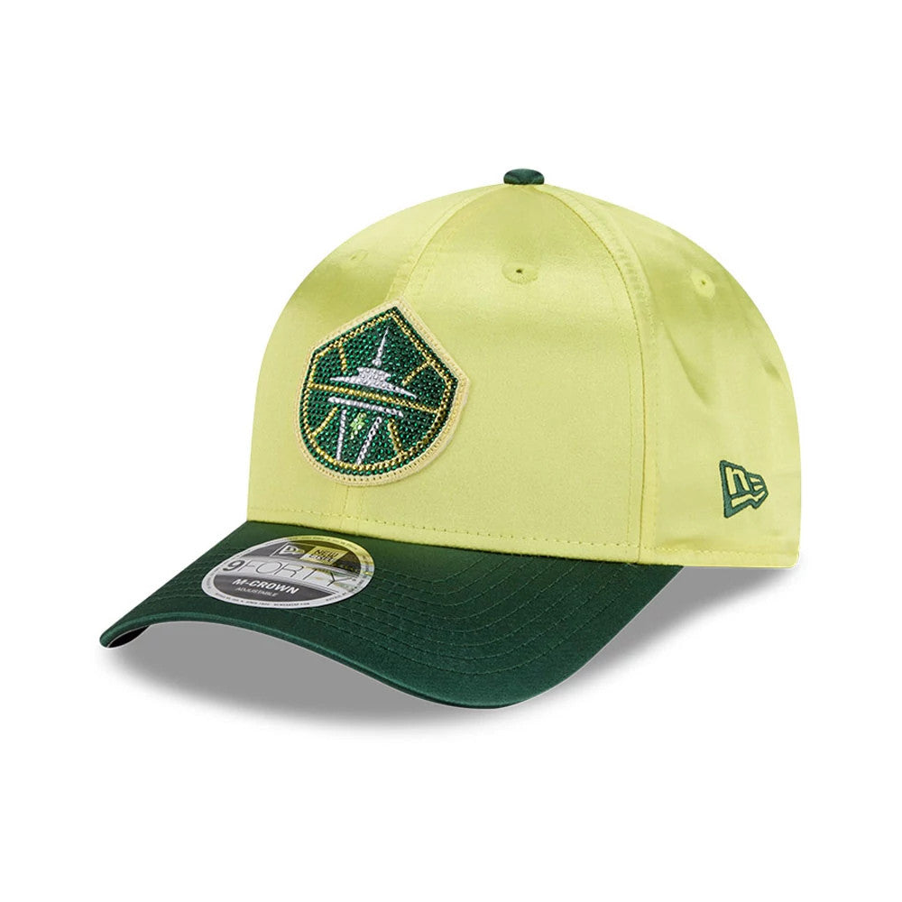Seattle Storm WNBA Draft 2026 Yellow New Era 9FORTY M-Crown Adjustable Cap, three-quarter view showing the green and white embroidered team logo on the front panel, green curved visor with the 9FORTY size sticker.
