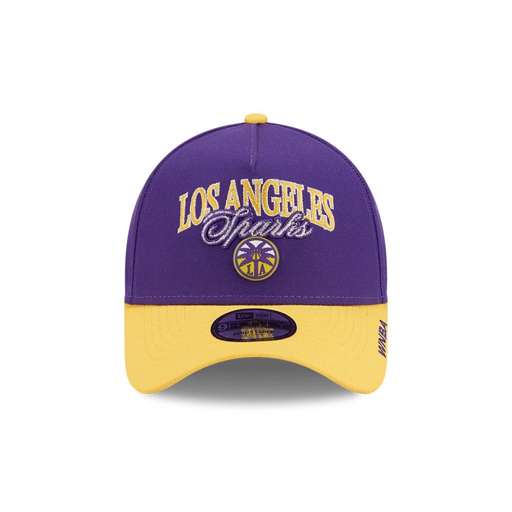 LA Sparks WNBA Tip Off 2026 Purple New Era 9FORTY A-Frame Adjustable Cap, front view showing the raised yellow Los Angeles Sparks embroidery on the purple crown, yellow undervisor, and the team logo with palm trees above the purple visor.